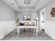 Bright home office with a white desk, chair and neutral walls at 437 W 86Th St, Indianapolis, IN 46260
