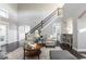 Spacious living room with hardwood floors, high ceilings, and a fireplace at 437 W 86Th St, Indianapolis, IN 46260