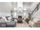 Spacious living room with hardwood floors, high ceilings, and a fireplace at 437 W 86Th St, Indianapolis, IN 46260