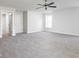 Spacious bedroom with ceiling fan and carpet at 437 W 86Th St, Indianapolis, IN 46260