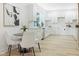 Modern white kitchen with ample cabinetry and island at 3031 N New Jersey St, Indianapolis, IN 46205