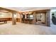 Finished basement with bar, game area, and additional seating at 8358 Hidden Point Dr, Indianapolis, IN 46256