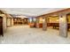 Spacious basement with a pool table, sitting area, and bar at 8358 Hidden Point Dr, Indianapolis, IN 46256