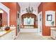 Luxurious bathroom with soaking tub, double vanity, and terracotta floors at 8358 Hidden Point Dr, Indianapolis, IN 46256