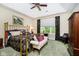 Relaxing bedroom with brass bed frame and floral accents at 8358 Hidden Point Dr, Indianapolis, IN 46256