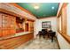Basement music room with grand piano and built-in shelving at 8358 Hidden Point Dr, Indianapolis, IN 46256