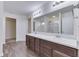 Double vanity bathroom with a large mirror and shower at 2277 Maple Stone Ln, Greenwood, IN 46143