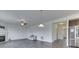 Living room with hardwood floors and kitchen access at 2277 Maple Stone Ln, Greenwood, IN 46143
