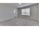 Bright bedroom with gray carpet and neutral walls at 2277 Maple Stone Ln, Greenwood, IN 46143