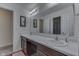 Bathroom with double vanity and large mirror at 2277 Maple Stone Ln, Greenwood, IN 46143