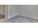 Spacious bedroom featuring grey carpet and a closet at 2277 Maple Stone Ln, Greenwood, IN 46143