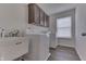 Laundry room with washer, dryer, and utility sink at 2277 Maple Stone Ln, Greenwood, IN 46143