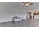 Bright living room with hardwood floors and kitchen access at 2277 Maple Stone Ln, Greenwood, IN 46143