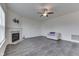 Spacious living room featuring a fireplace and vinyl plank flooring at 2277 Maple Stone Ln, Greenwood, IN 46143