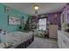 Vibrant bedroom with teal and purple walls at 2277 Maple Stone Ln, Greenwood, IN 46143