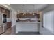 Modern kitchen with stainless steel appliances and island at 2277 Maple Stone Ln, Greenwood, IN 46143
