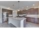 Modern kitchen with stainless steel appliances and island at 2277 Maple Stone Ln, Greenwood, IN 46143