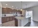 Modern kitchen with stainless steel appliances and island at 2277 Maple Stone Ln, Greenwood, IN 46143
