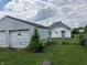 View of house and detached garage from the backyard at 2506 Morton St, Anderson, IN 46016