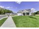 New construction home with a stone and siding exterior and a nicely landscaped lawn at 11419 Neptune Dr, Fishers, IN 46040