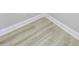 Light wood-look vinyl plank flooring at 11419 Neptune Dr, Fishers, IN 46040
