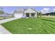 Gray house with white trim and green lawn at 11419 Neptune Dr, Fishers, IN 46040