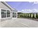 Spacious concrete patio with sliding glass doors at 11419 Neptune Dr, Fishers, IN 46040