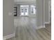 Open great room with door to backyard at 11419 Neptune Dr, Fishers, IN 46040