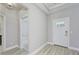 Light and bright entryway with wood-look flooring at 11419 Neptune Dr, Fishers, IN 46040