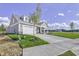 Craftsman style home with gray siding, white trim, and a two-car garage at 11419 Neptune Dr, Fishers, IN 46040