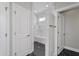 Walk-in shower with marble tile and bench seat at 11419 Neptune Dr, Fishers, IN 46040