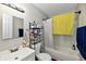 Neat bathroom with bathtub, shower, and plenty of storage at 2813 Grassy Creek Dr, Indianapolis, IN 46229