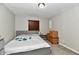 Cozy bedroom with gray carpeting and a double bed at 2813 Grassy Creek Dr, Indianapolis, IN 46229