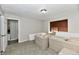Cozy spare bedroom with two sofas and a window with blinds at 2813 Grassy Creek Dr, Indianapolis, IN 46229