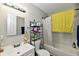 Clean bathroom with a bathtub, shower, and updated vanity at 2813 Grassy Creek Dr, Indianapolis, IN 46229