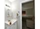Clean bathroom with white vanity and medicine cabinet at 2813 Grassy Creek Dr, Indianapolis, IN 46229