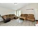 Comfortable living room with two reclining sofas and a marble-top coffee table at 2813 Grassy Creek Dr, Indianapolis, IN 46229