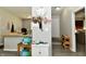 Inviting entryway with coat rack and shoe storage at 2813 Grassy Creek Dr, Indianapolis, IN 46229