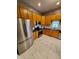 Updated kitchen featuring stainless steel appliances and ample wood cabinetry at 32 E Caven St, Indianapolis, IN 46225