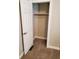 Empty closet with wood shelving and a hanging rod at 32 E Caven St, Indianapolis, IN 46225