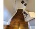 Dark wood staircase leading to the upper level at 32 E Caven St, Indianapolis, IN 46225