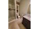 Clean bathroom with shower, toilet and vanity at 32 E Caven St, Indianapolis, IN 46225