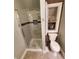 Small bathroom with shower, toilet and niche at 32 E Caven St, Indianapolis, IN 46225