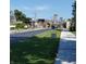 City street view with green space and buildings at 32 E Caven St, Indianapolis, IN 46225