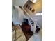 Elegant staircase with dark wood and white railings at 32 E Caven St, Indianapolis, IN 46225