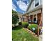 Inviting front porch with seating and decorative planters at 32 E Caven St, Indianapolis, IN 46225
