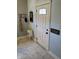 Bright entryway with tile floor and white door at 32 E Caven St, Indianapolis, IN 46225