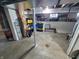 Unfinished basement area with storage options at 32 E Caven St, Indianapolis, IN 46225