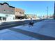 City street with cyclist and buildings at 32 E Caven St, Indianapolis, IN 46225