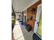 Inviting front porch with seating and decorative planters at 32 E Caven St, Indianapolis, IN 46225